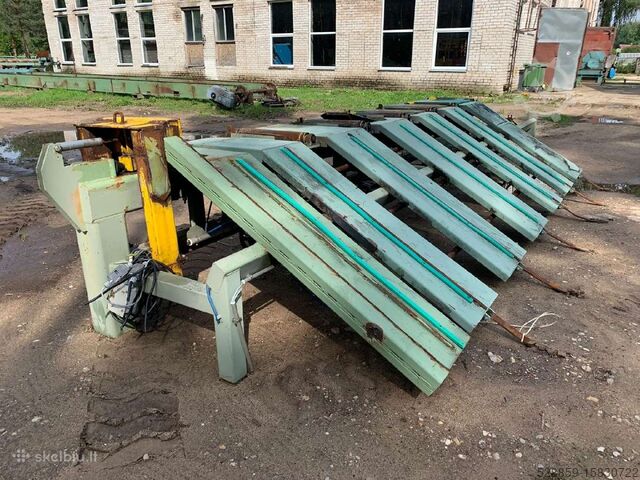 Роликовый конвейер с боковыми пушерами Heinola 