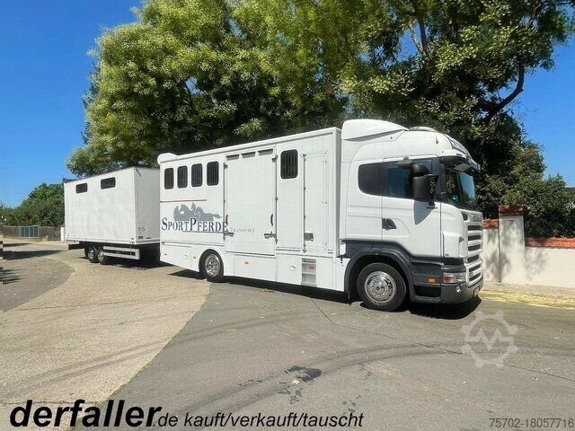 Скотовоз Scania R310 mit Spier Hänger 15 Pferde