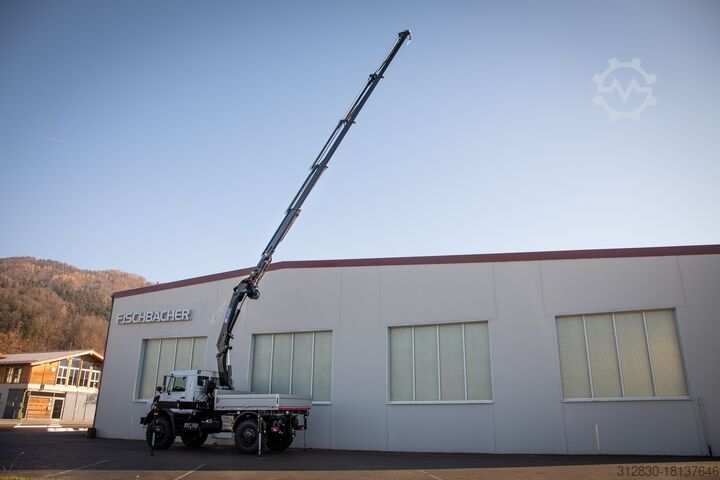 Грузовик с крановой надстройкой Unimog U5023 KRANIMOG Sondermodell KARL mit HMF 1620