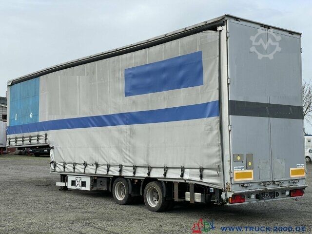 Низкорамный полуприцеп Meusburger Spezialtieflader Geschlossen Stapler-Maschinen