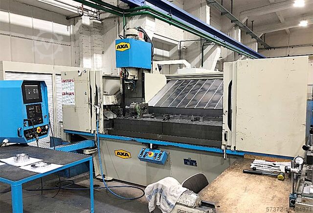 Обрабатывающий центр с ЧПУ AXA VSC 1