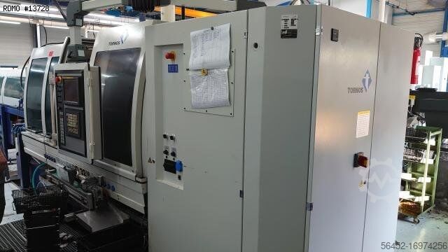 Многошпиндельный токарный станок с ЧПУ TORNOS MULTIDECO 32/6i