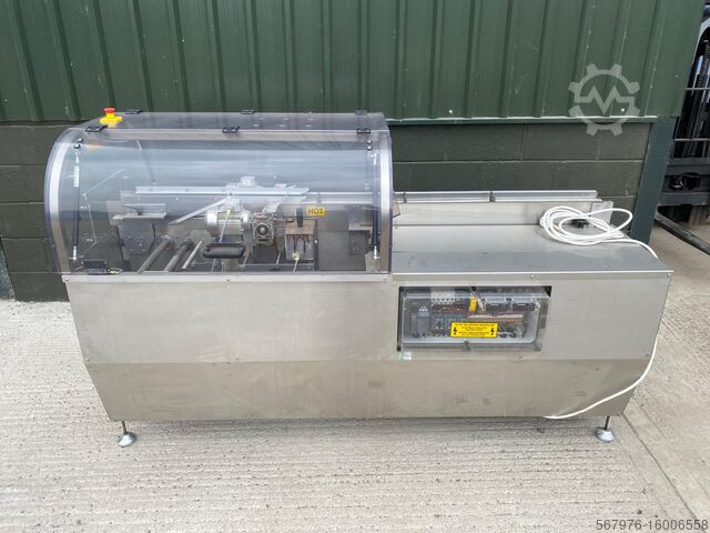 машина для запечатывания коробок Jacob White (Packaging) Ltd NS-TFS Carton Sealer