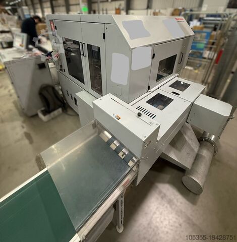 Автоматический трехножевой обрезной станок с переменной настройкой Horizon HT-1000V Variable Trimmer