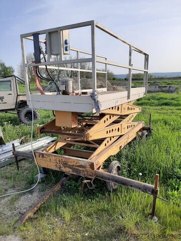 Электрический ножничный подъемник Electric Scissor Lift 