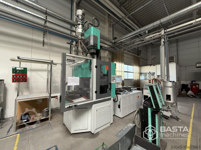 Arburg 1200 T 2000-800 (вертикальный, поворотный стол, часы работы: 9.562) Arburg 1200 T 2000-800