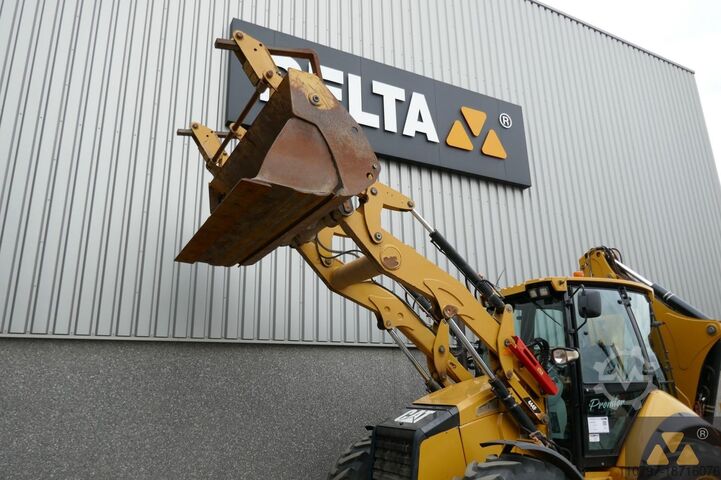 Комбинация экскаватор/погрузчик Caterpillar 444F