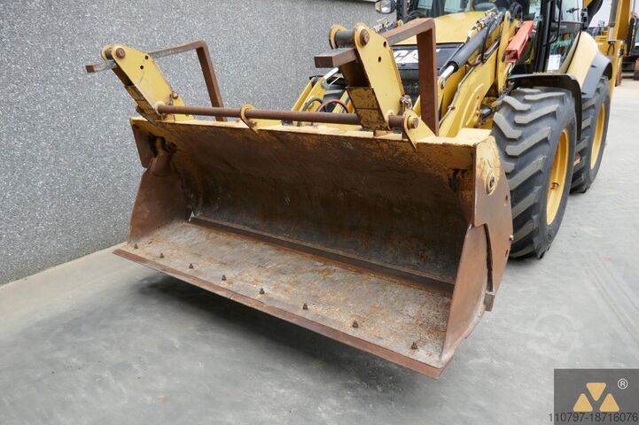 Комбинация экскаватор/погрузчик Caterpillar 444F