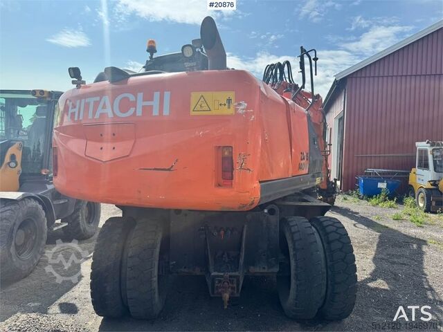 Колесный экскаватор Hitachi ZX140W-5B Wheeled excavator w/ Rototilt and 2 buck