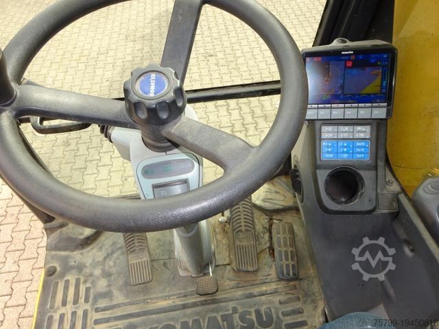 Колёсный экскаватор KOMATSU PW180-11