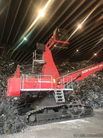 Гусеничный экскаватор CATERPILLAR 330D Mantsinen 50RCT