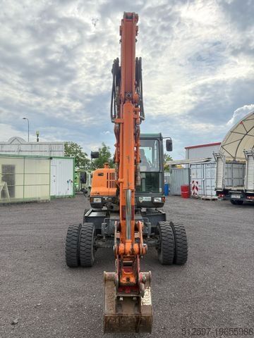 Колёсный экскаватор DOOSAN DX 55 W / gepflegt / 4.450 Bh