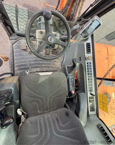 Колёсный экскаватор DOOSAN DX 55 W / gepflegt / 4.450 Bh