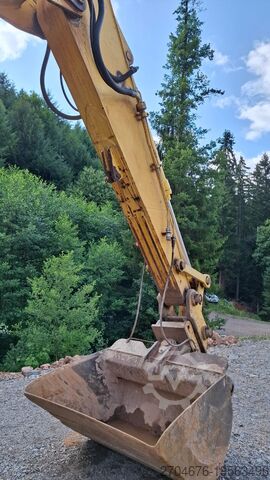 Гусеничный экскаватор New Holland E215 B L-Mono