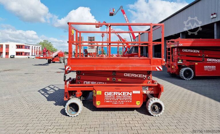 Ножничный подъемник Holland Lift Y 83 EL 16