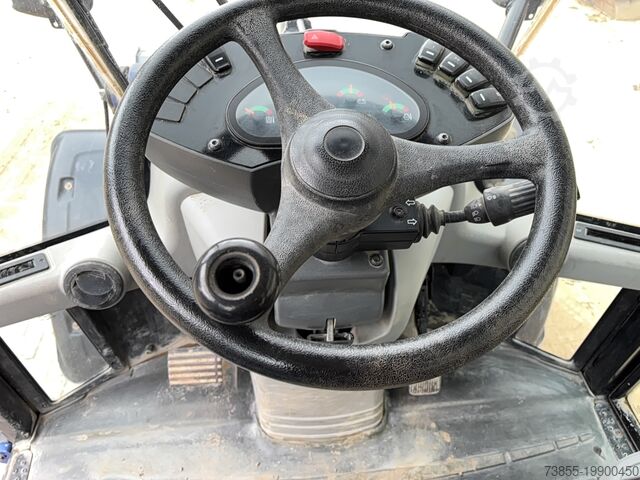 Колесный погрузчик Caterpillar 908M