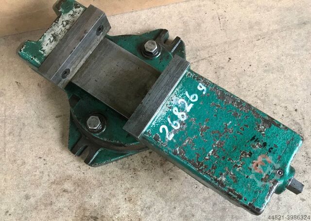 Материальные тиски  