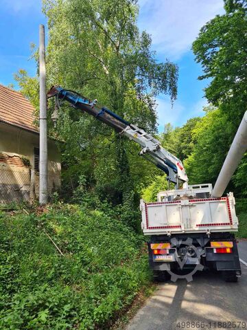 Трехсторонний самосвал с краном MAN F2000