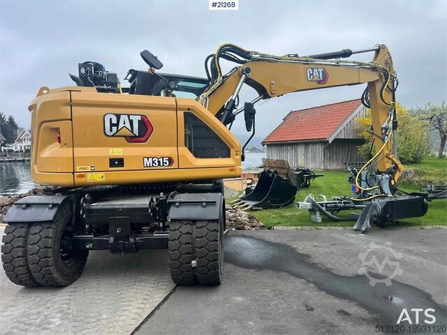 Колесный экскаватор Caterpillar M315