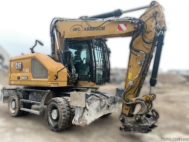 Мобильный экскаватор Caterpillar M318