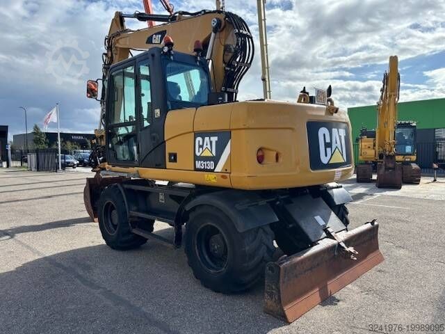 Колесный экскаватор Caterpillar M 313 D