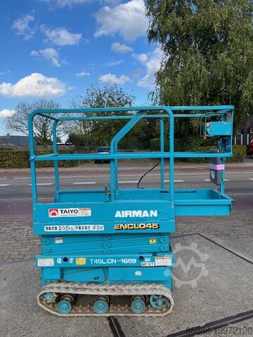 Используемый гусеничный ножничный подъёмник Airman ENCL045 AIRMAN Encl.045