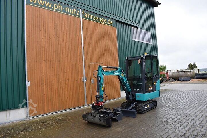 Экскаватор-погрузчик Sunward SWE17F, Aktion