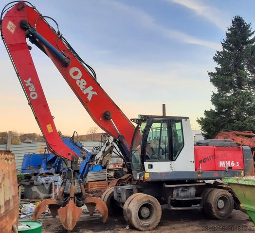 Погрузочно-разгрузочный экскаватор O&K MH 6.5