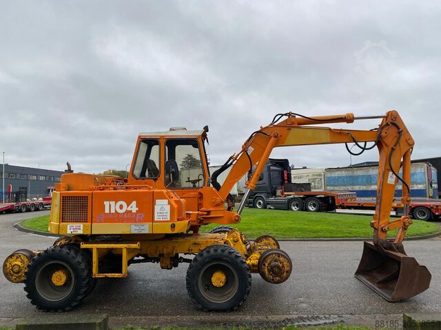 мобильный экскаватор дорожный-рельсовый ATLAS 1104
