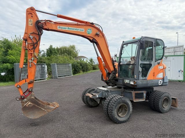Колёсный экскаватор DOOSAN DX 55 W / gepflegt / 4.600 Bh
