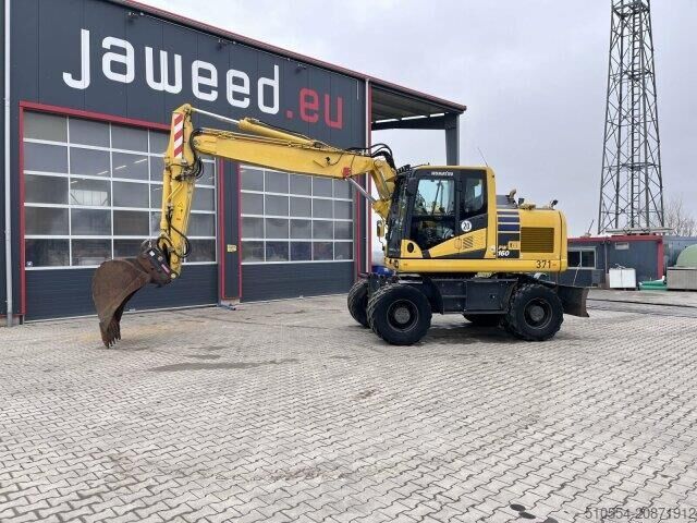 Колесный экскаватор Komatsu PW 160-11 Straßenzulassung + Anhängerkupplung