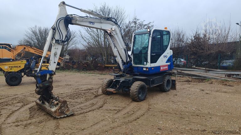 колёсный экскаватор Hyundai R55W-9A with 3 excavator buckets