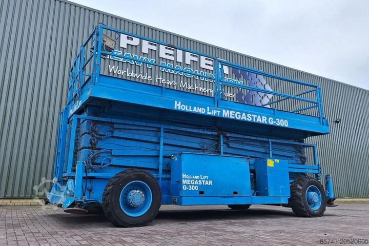 Ножничный подъемник Holland Lift Megastar G300 Diesel, 4x4x4 Drive, 33.5m Working H