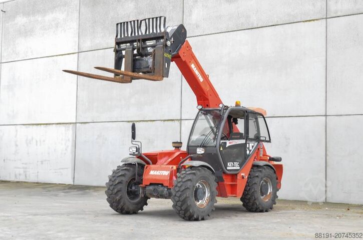 Телескопический погрузчик Manitou MHT 780