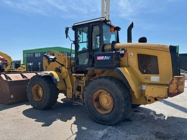 Колесный погрузчик CAT 938 M