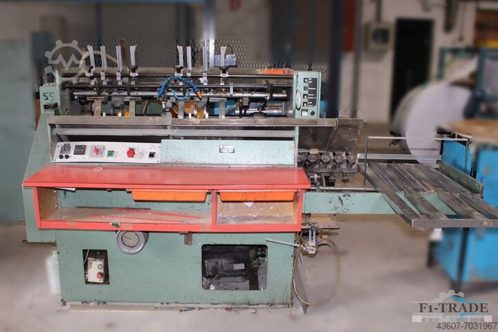 Машина для обрезки торцевых листов Hunkeler VEA 400