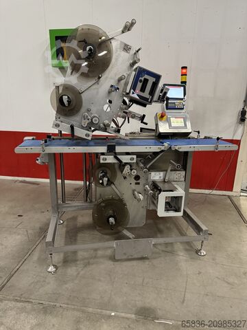 Маркировка с верхним и нижним принтером Zodiac Labeling with printer top and bottom Zodiac