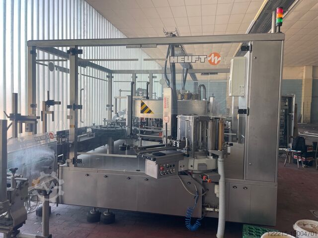 Этикетировщик Heuft Tornado с холодным клеем/мокрым клеем (2005) Heuft Kaltleim / Nassleimetikettierer