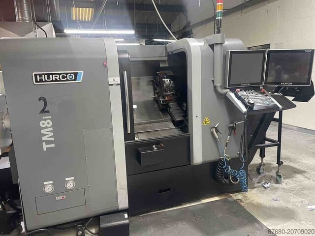Токарный станок с ЧПУ с автоматической подачей прутка. HURCO TM-8i