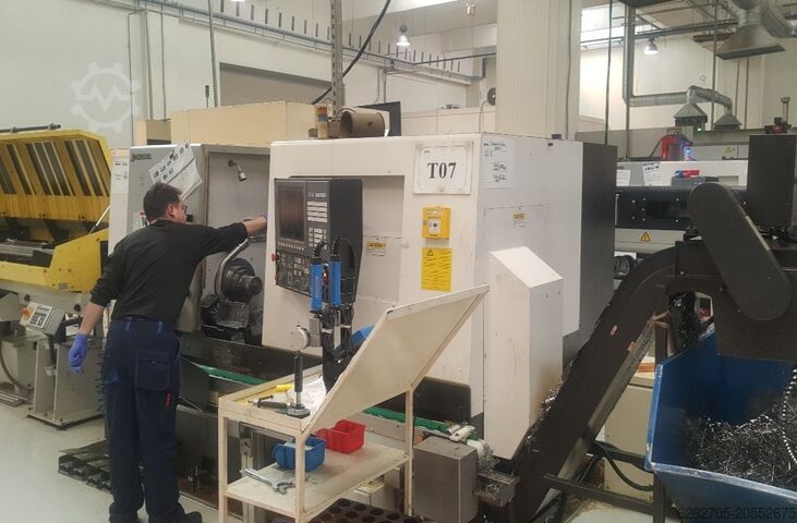 токарный станок с ЧПУ Okuma L300-MW