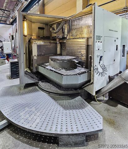 Обрабатывающий центр с ЧПУ DMG DMU 100T