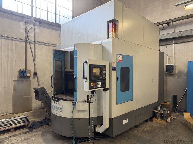 вертикальный обрабатывающий центр с поворотным поддоном euma spinner ME 1020S