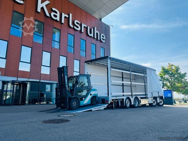 Эвакуатор VOLVO FH 500 Gabelstaplertransporter LBW 9t Dhollandia