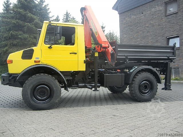 Другие Mercedes-Benz UNIMOG 1300L mit großem Kran + Funkfernsteuerung